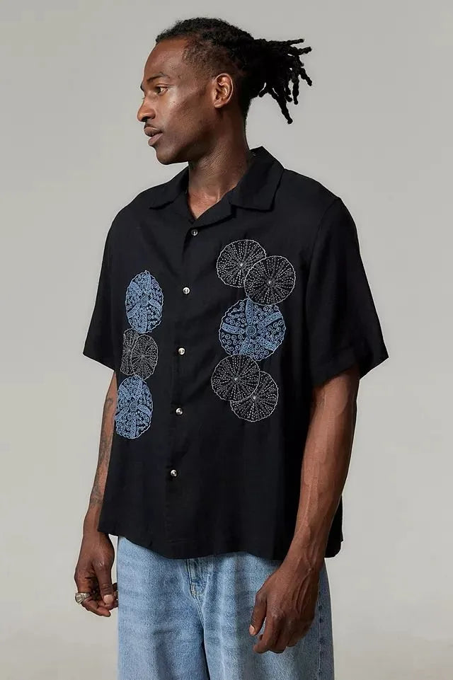 Black cotton camp shirt with embroidered blue and grey mandala patches